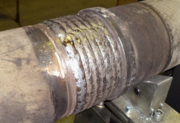 Пример наплавленной на установке АС354 цилиндрической наружной поверхности выполненный с колебаниями горелки